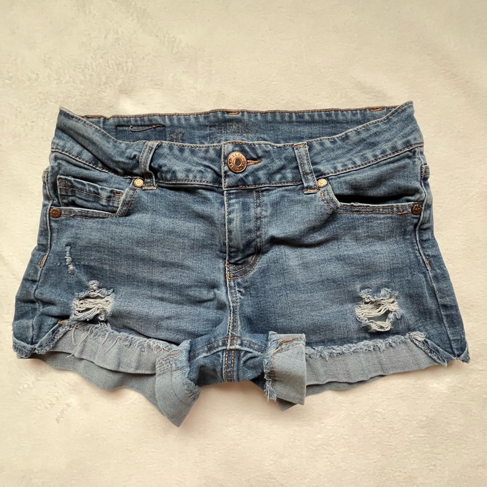 Celebrity Pink Blue Distressed Jean Shorts